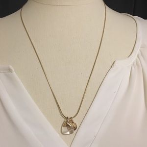 Gold Zara necklace with charms.